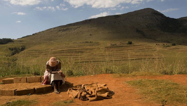 Photo: A farmer takes a break in Swaziland. Credit: FAO/Rodger Bosch