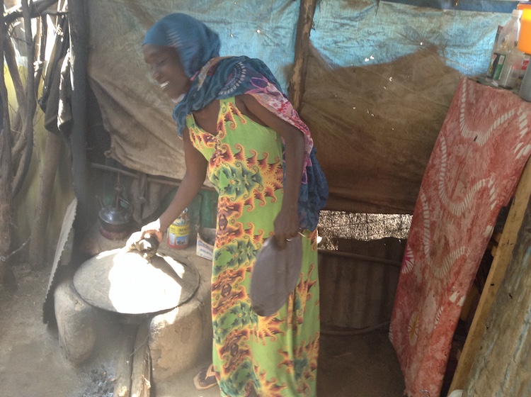 Najma Hassan cooking in her kitchen in Kakuma refugee camp, Kenya, Credit: Justus Wanzala | IDN-INPS
