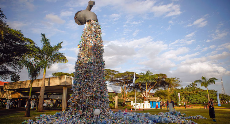 Photo: A 30-foot-high monument entitled 'Turn off the plastics tap' by Canadian activist and artist Benjamin von Wong stands outside the venue for the UN Environment Assembly that concluded on March 2, 2022 in Nairobi, Kenya. Credit: UNEP/Cyril Villemain